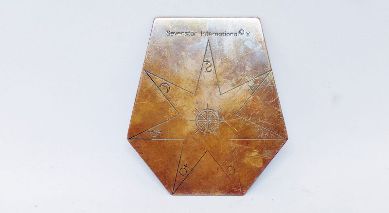 Kobberplade med symboler mrk. "Sevenstar International"