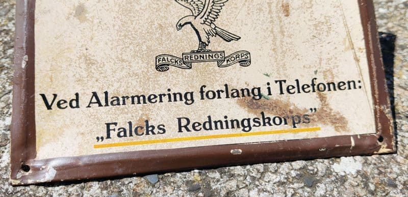 Abonnent paa Falcks Redningskorps blikskilt