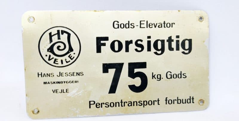 Hans Jessens Forsigtig 75 kg Gods - blikskilt fra elevator