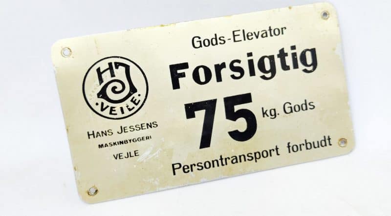 Hans Jessens Forsigtig 75 kg Gods - blikskilt fra elevator
