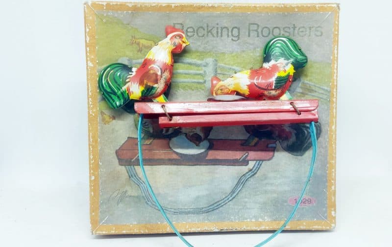Mekanisk bliklegetøj. Hakkende høns. Pecking Rooster 1029
