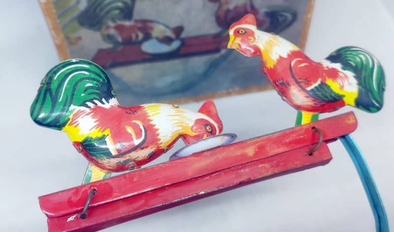 Mekanisk bliklegetøj. Hakkende høns. Pecking Rooster 1029