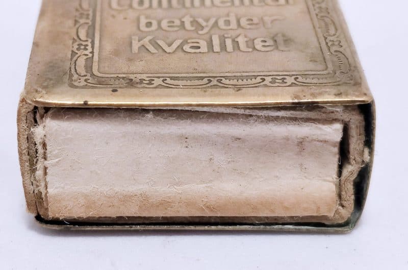 Continental betyder kvalitet. Gammel tændstiksæskeskjuler i massiv messing. Reklame for skosåler.
