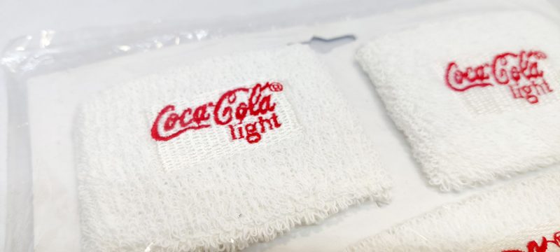 Originalt sæt Coca Cola Light reklame svedbånd (pandebånd + håndled)