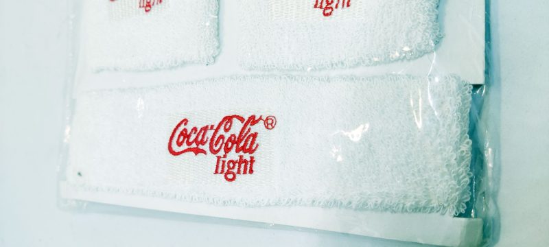 Originalt sæt Coca Cola Light reklame svedbånd (pandebånd + håndled)