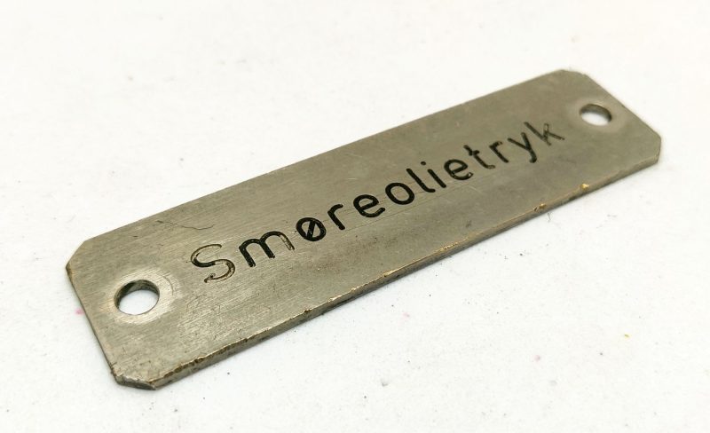 Smøreolietryk. Metalskilt
