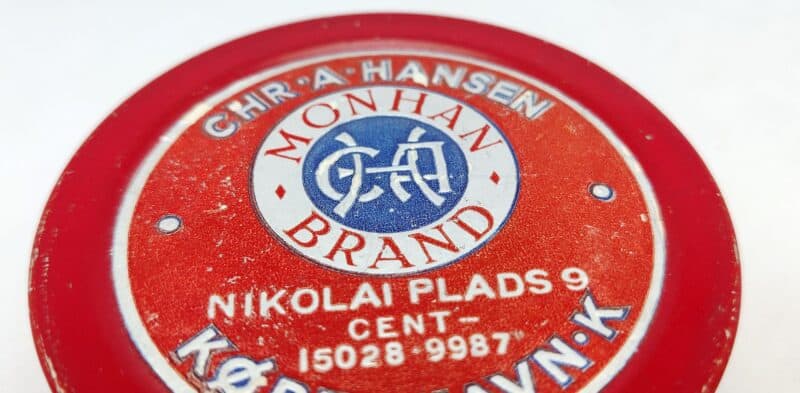 Chr. A. Hansen. København. Nikolai Plads 9. Cent 9987 Monhan Brand. Blikdåse