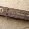 Listefabriken Hønnerup. Lister til alle formål. Reklame-klemme