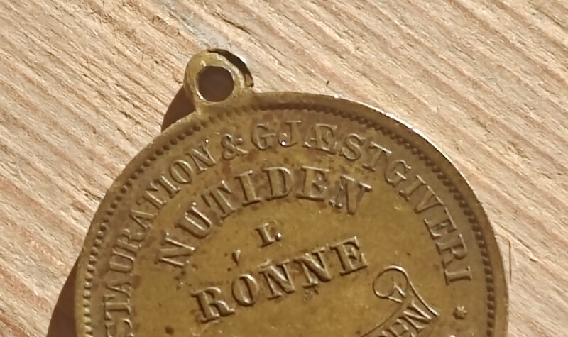 Reklamevedhæng fra Restaurant & gjæstgiveri Nutiden i Rønne